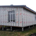 Подготовка фасадов дома из сип панелей под отделку